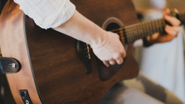 playing_guitar_bracelet_unsplash